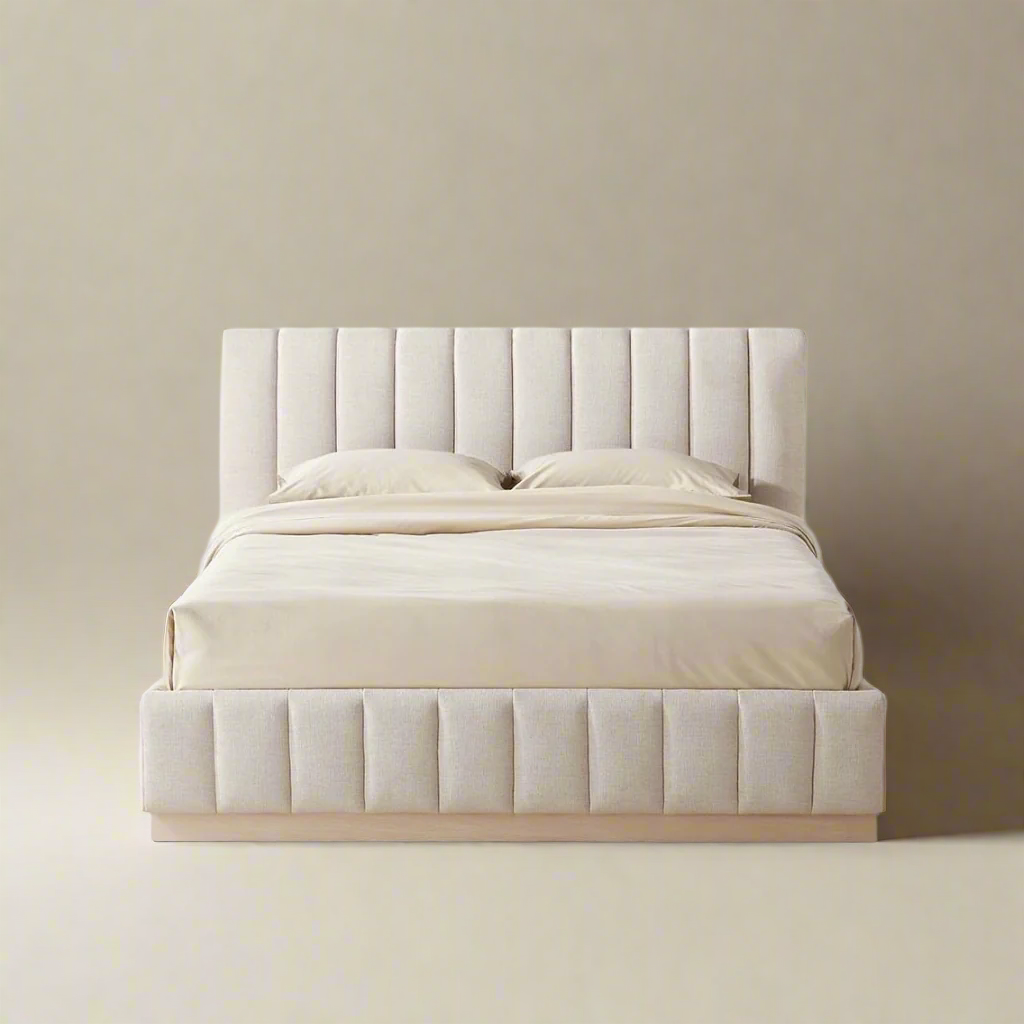 Alora Ashwood Bed featuring vertical tufted headboard and matching base in soft beige upholstery on neutral background