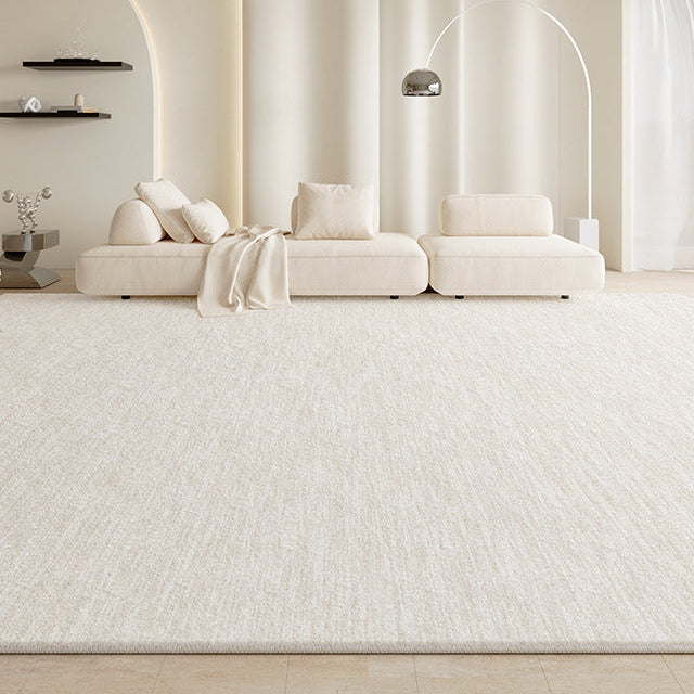 Amelia Rug in a modern beige living room with a large cream sectional sofa and soft natural lighting