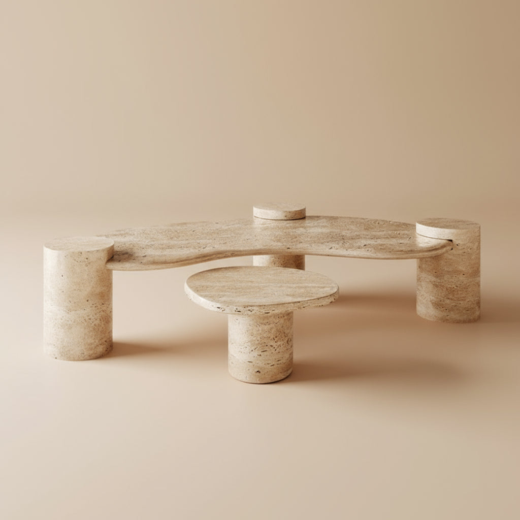 Ardea Travertine Coffee Table Set featuring sculptural cylinder legs and curved stone tops in a minimalist beige studio setting