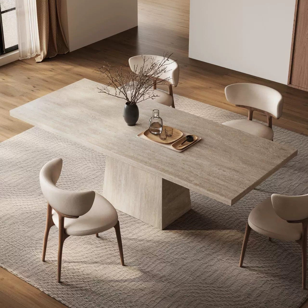 Top angle view of Ardella sintered stone dining table with trapezoid base and beige chairs in warm contemporary dining room