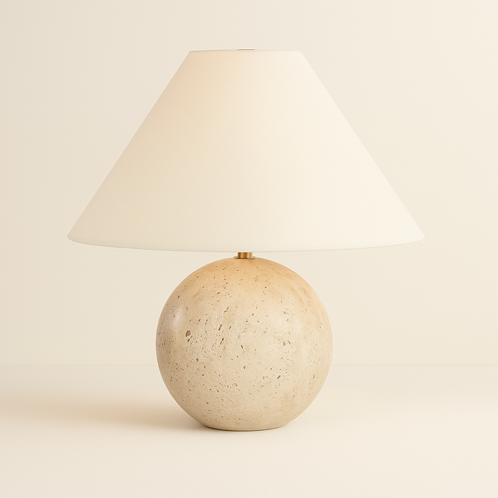 Arlo Sphere Table Lamp with natural travertine stone round base and wide tapered white fabric shade on beige background