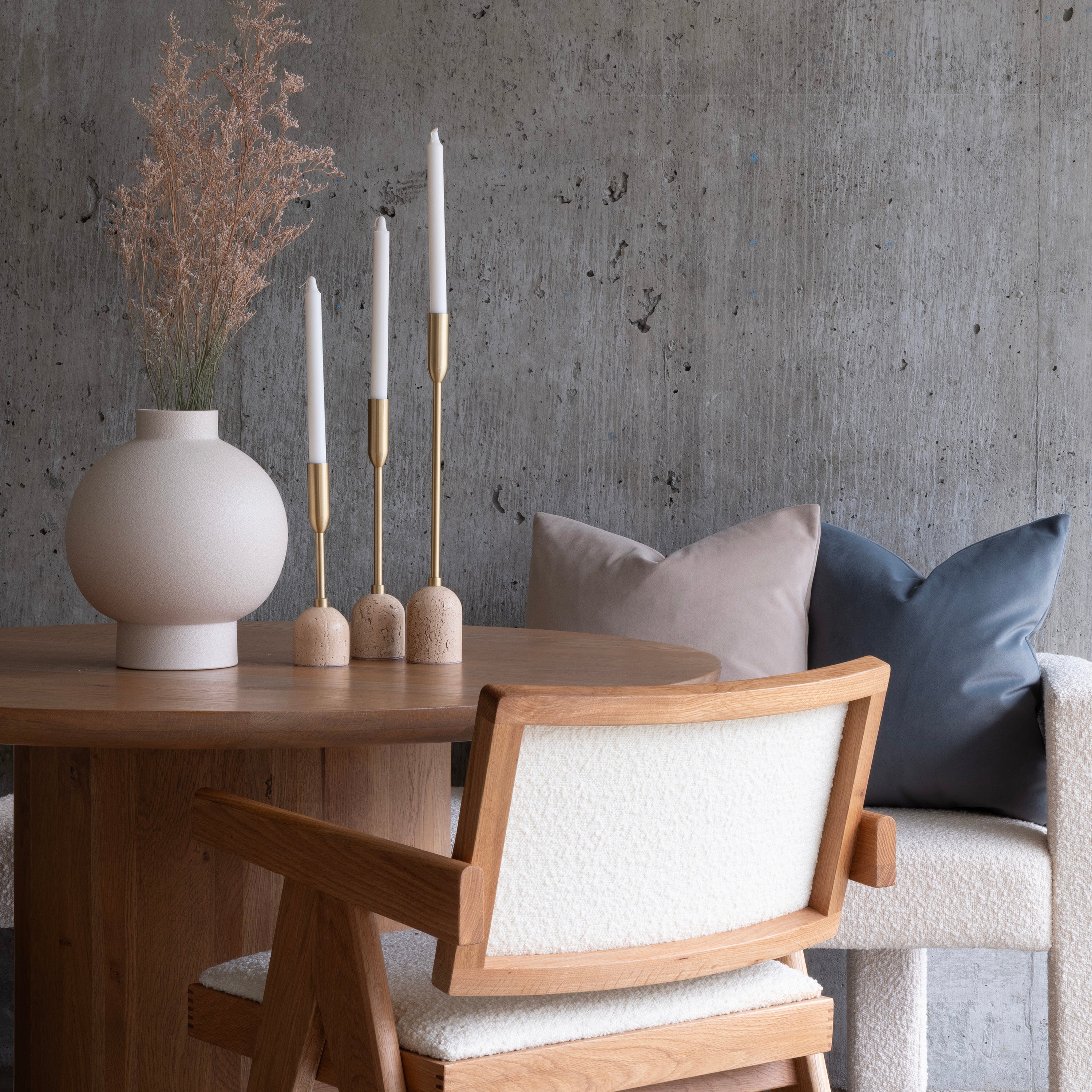 Aurelia Candle Holders styled on round wood dining table with ceramic vase and neutral decor