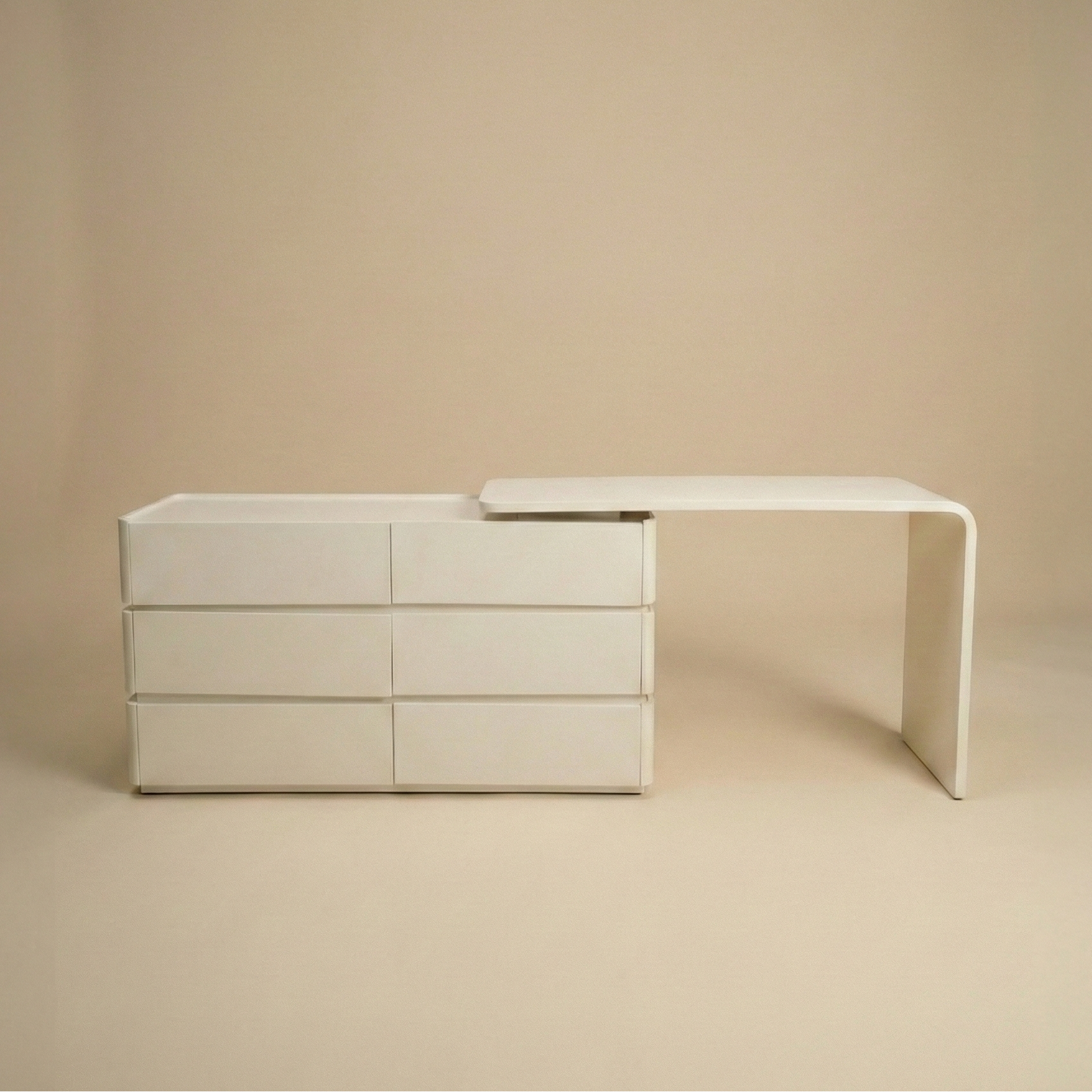 Front view of the Avina white vanity desk showing six spacious storage drawers and a sleek waterfall edge desk leg.