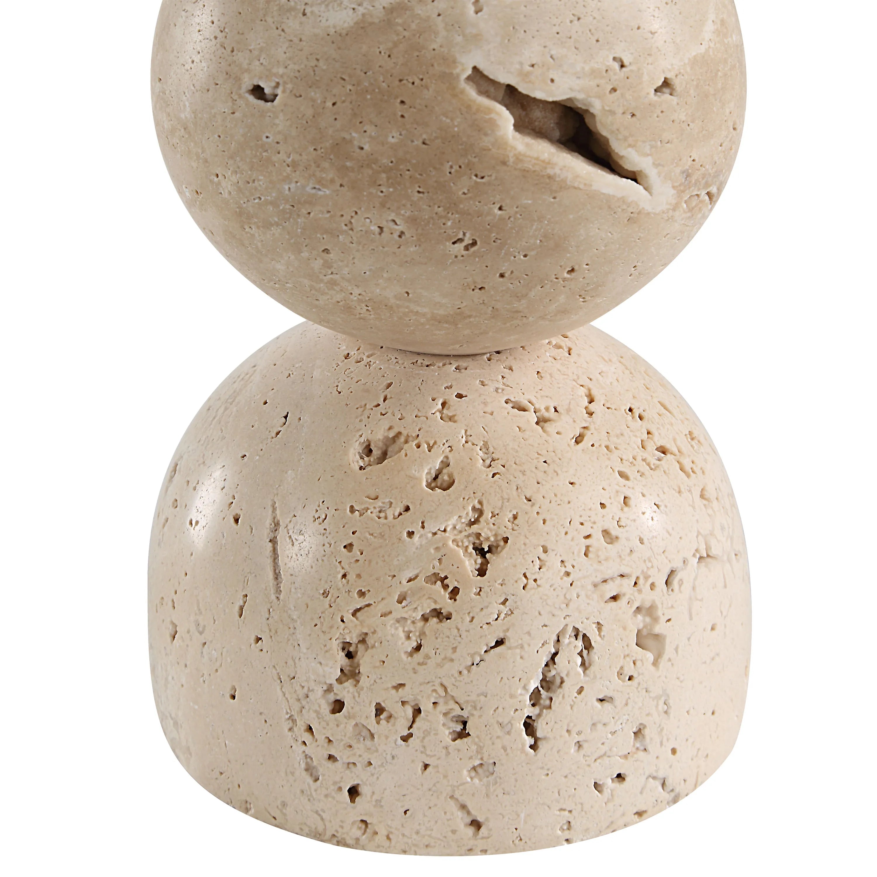 Close-up of Caelo Candle Duo showing natural travertine stone texture with organic pores and warm beige surface details