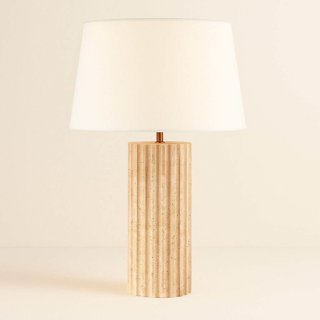 Callisto Travertine Table Lamp with fluted natural stone base and cream fabric shade on beige studio background