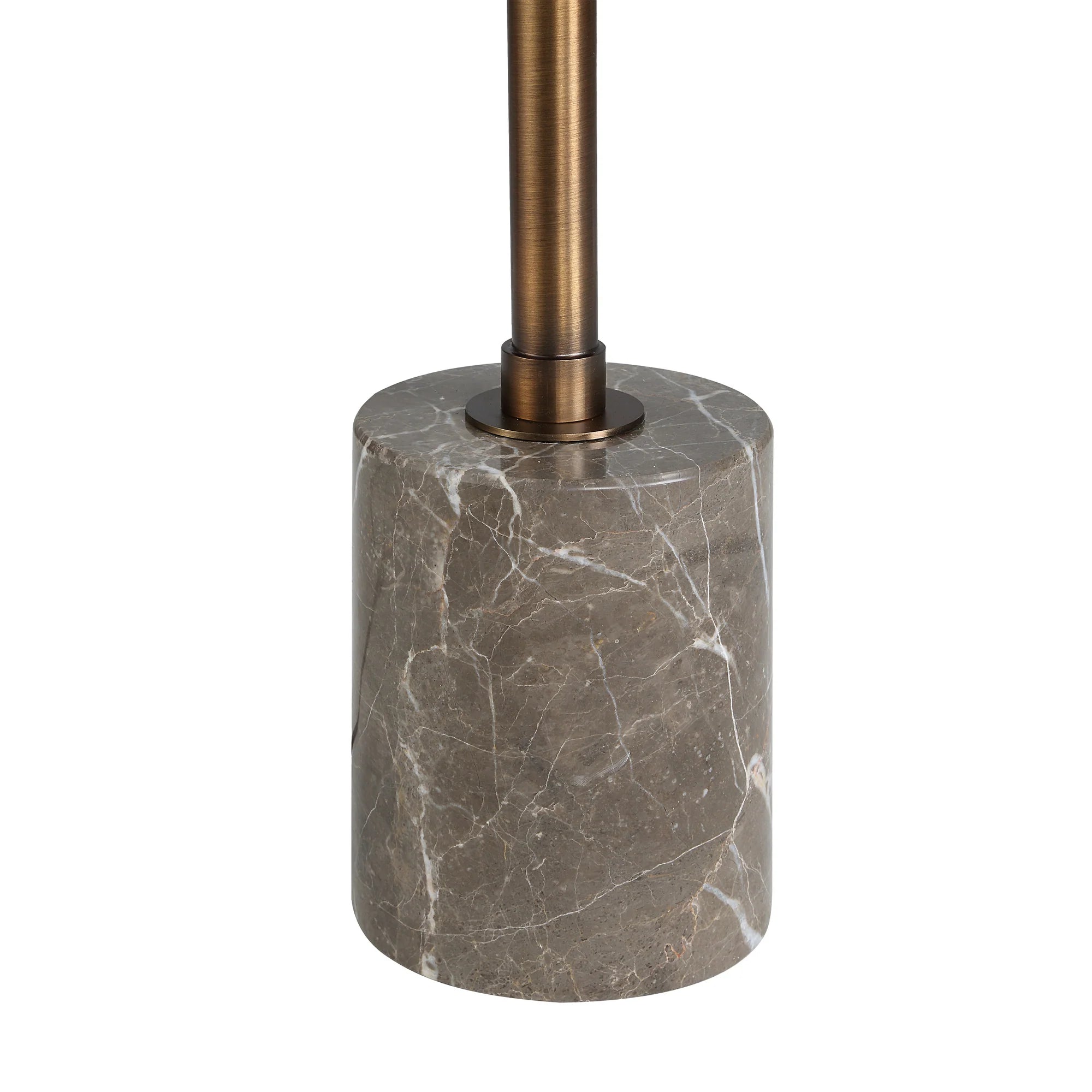 Macro detail of the Calloway floor lamp's solid grey marble cylindrical base with natural white veining.