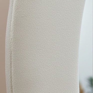 Close-up detail of the Cloud-shape Full Body Mirror’s textured white frame.