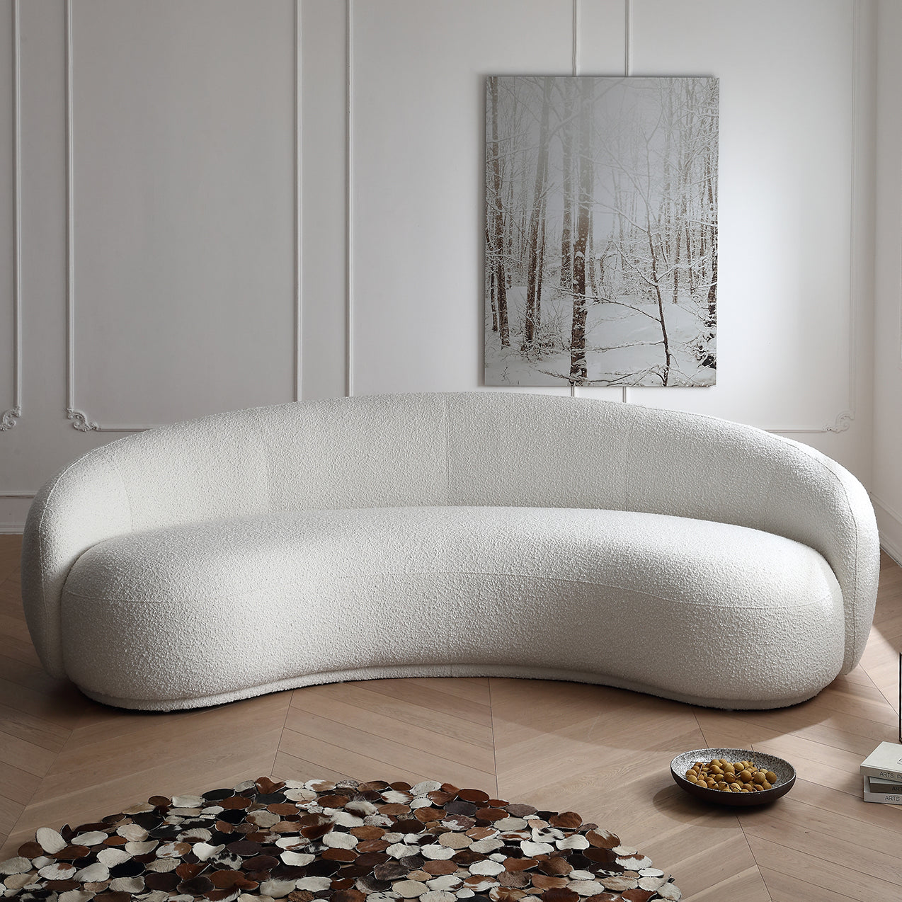 Contour Bliss Bouclé Sofa in white bouclé fabric with curved design in modern living room interior