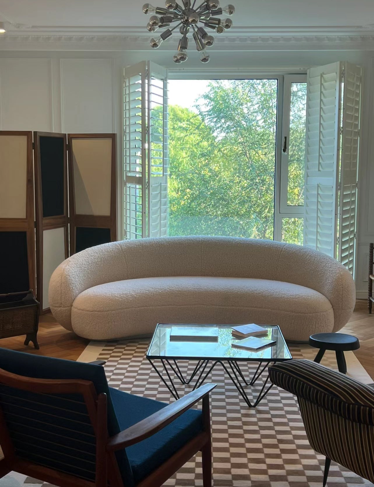 Contour Bliss Bouclé Sofa in bright living room with open windows and modern decor