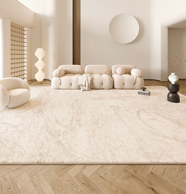 Creamstone Vista Rug styled in a neutral living room with plush cream sofa and modern decor