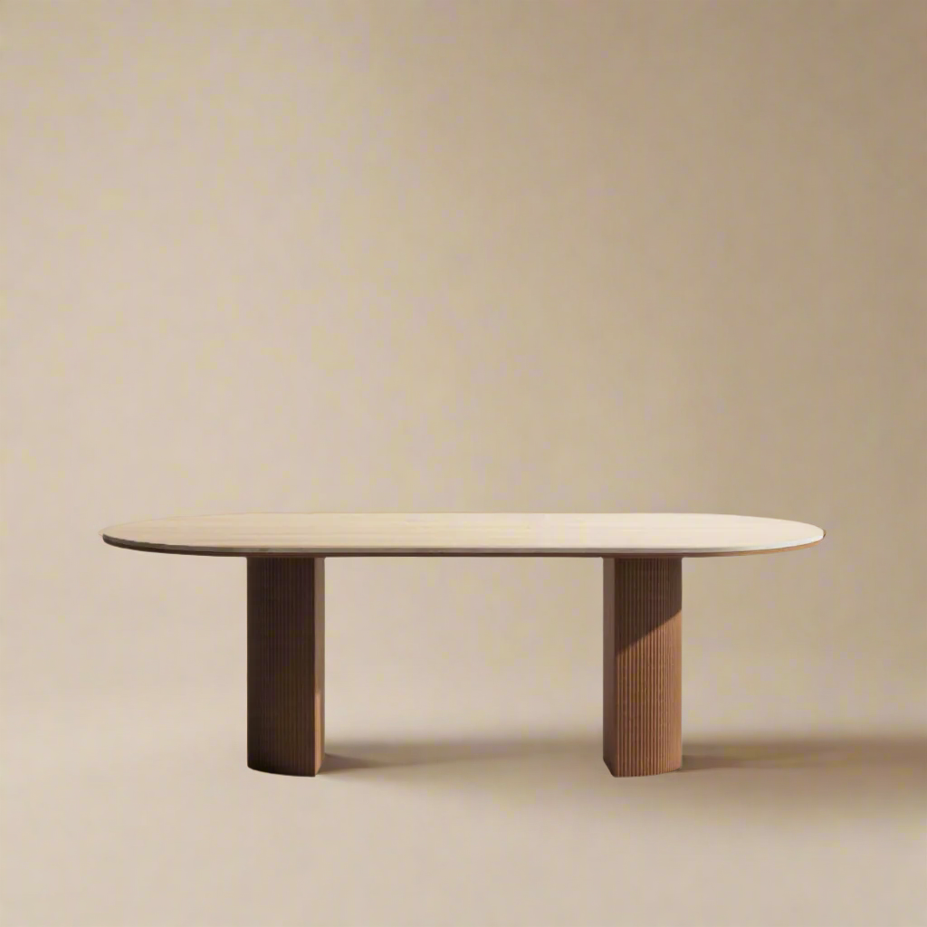 Crescent Grove Dining Table featuring a sleek sintered stone top and dual fluted wood bases in a minimalist studio setting