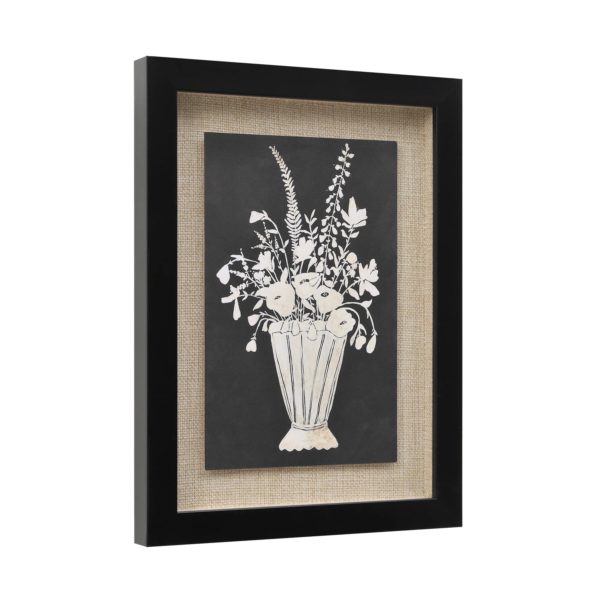 Angled view of the Daphne botanical wall art highlighting its deep black frame and textured woven matting.