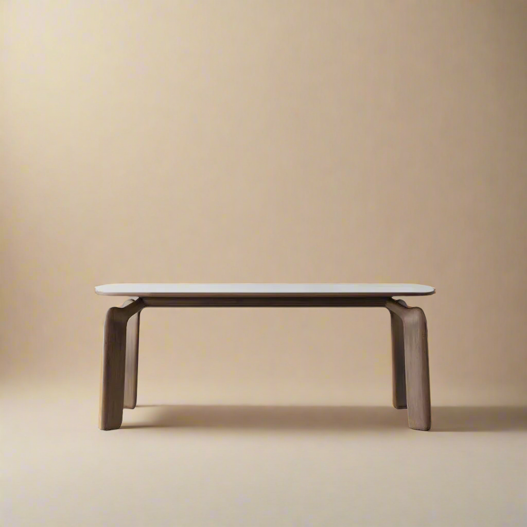 Front view of Eclipse Elegance dining table with sintered stone top and curved solid wood legs on beige studio background