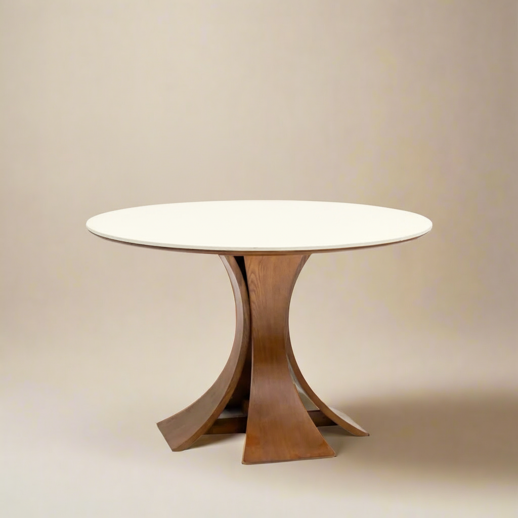 Elowen Round Dining Table with white top and sculpted walnut base against neutral beige background