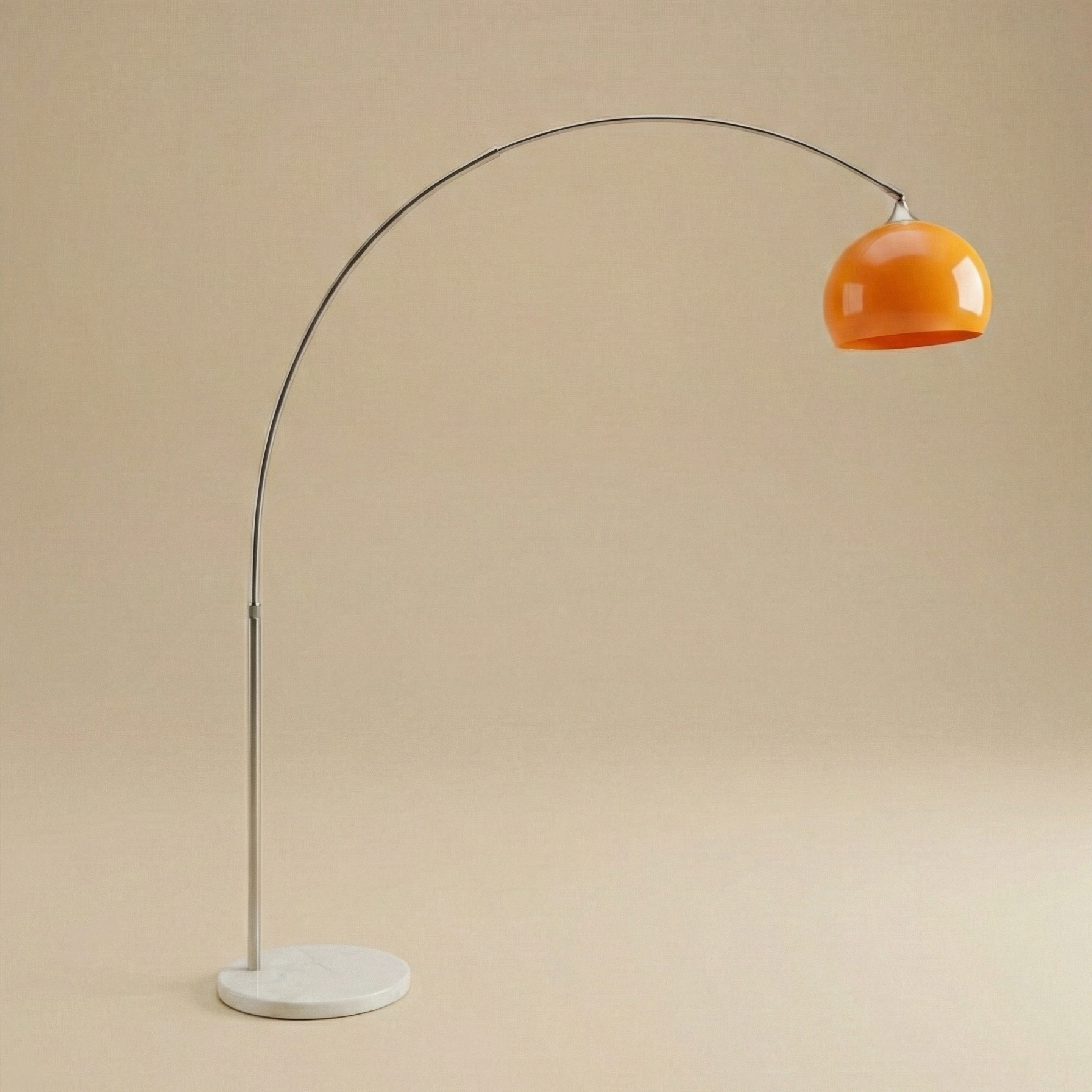 Floor lamp with orange shade and marble base on a beige background