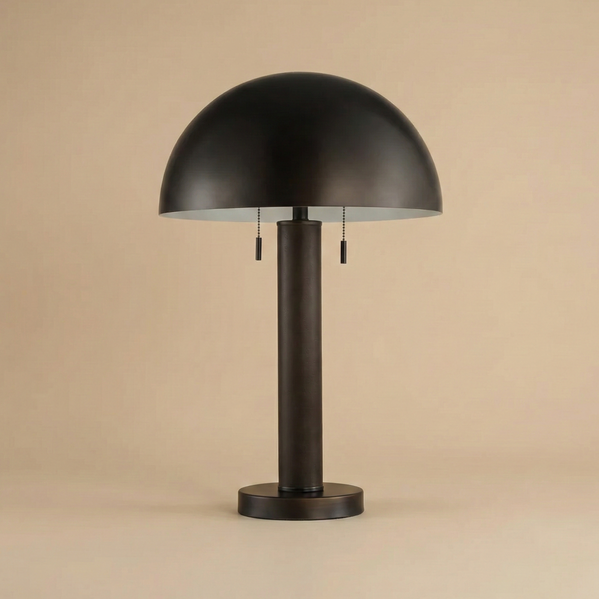 Front view of the Harrison table lamp showing the brown faux leather wrapped column stem and oil-rubbed bronze metal finish.