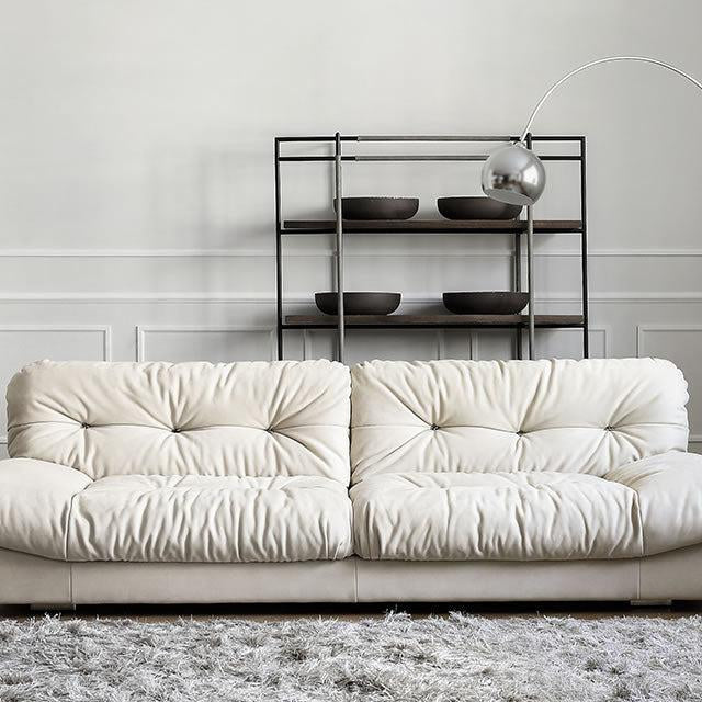 Italian-style Cloud Sofa in cream ultra suede upholstery with tufted cushions, displayed in a bright modern living room