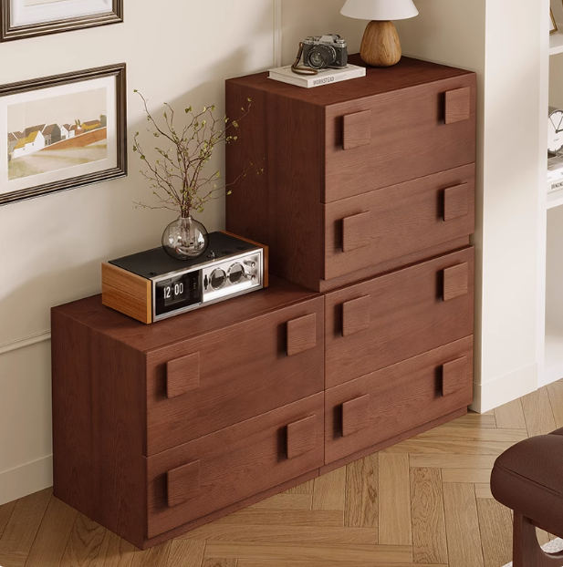 Jasper Modular Sideboard stacked in a modern living room, featuring walnut finish and square drawer handles with decor on top.