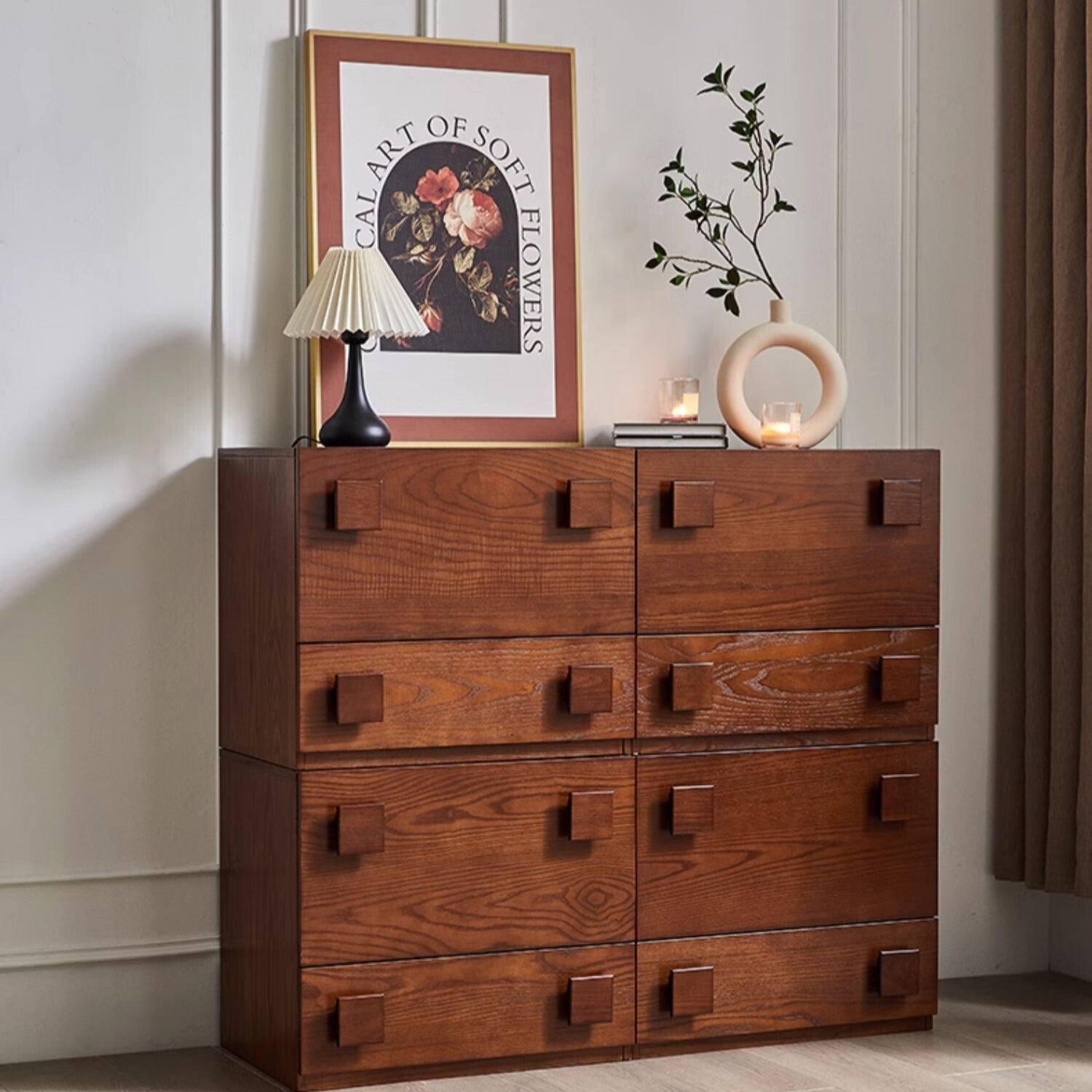 Jasper Modular Sideboard stacked in a tall configuration with walnut finish and square handles, styled with decor and artwork.