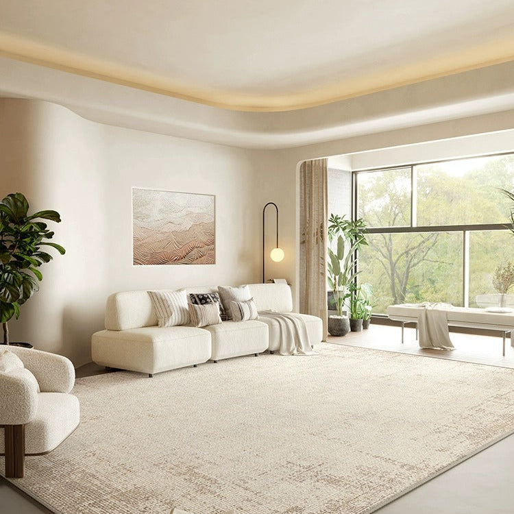 Luxe Earth Tone Rug styled in a bright neutral living room with a cream sofa and warm decor accents