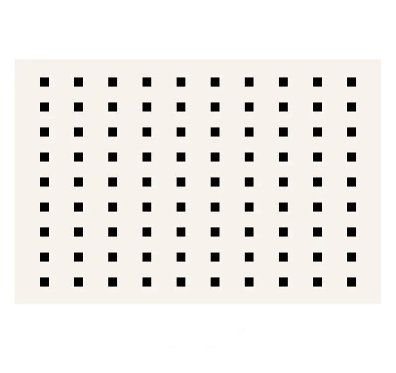 Modern Square Design Rug featuring a clean grid pattern of black squares on a soft cream background.