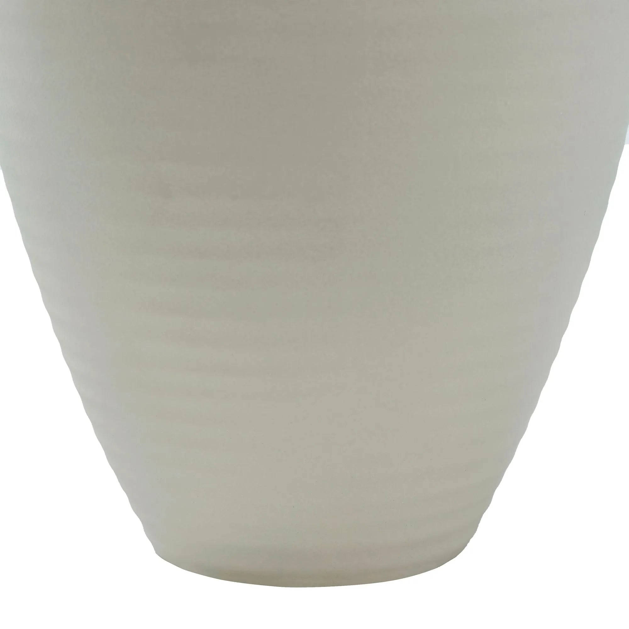 Close-up of Nara Ceramic Vase base showing subtle ribbed texture and smooth matte ivory finish