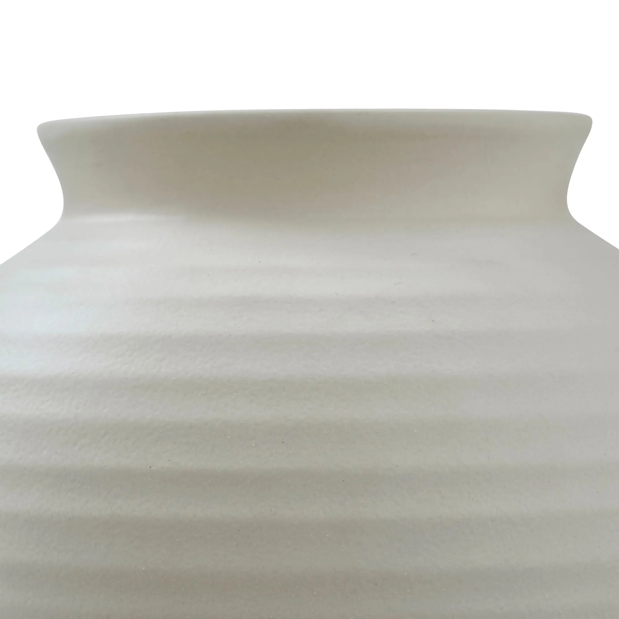 Close-up of Nara Ceramic Vase showing the smooth ribbed texture and curved neck in matte ivory finish