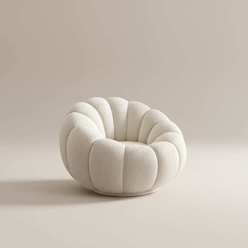 Ophelia Bouclé Swivel Accent Chair with a rounded sculptural shape, upholstered in soft bouclé on a beige studio background