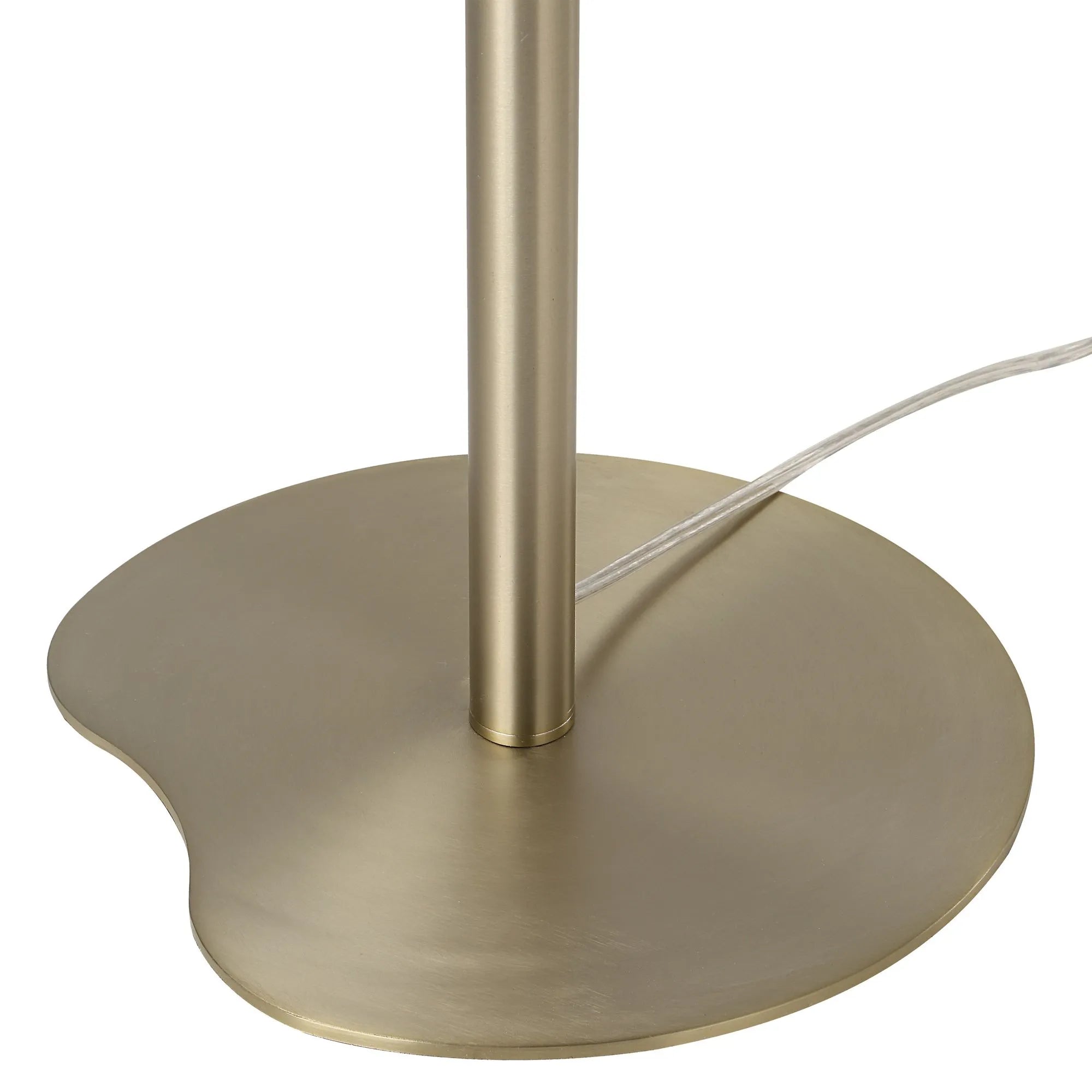 Close-up of Pearl Glow Floor Lamp base in brushed brass with sculptural, rounded shape.