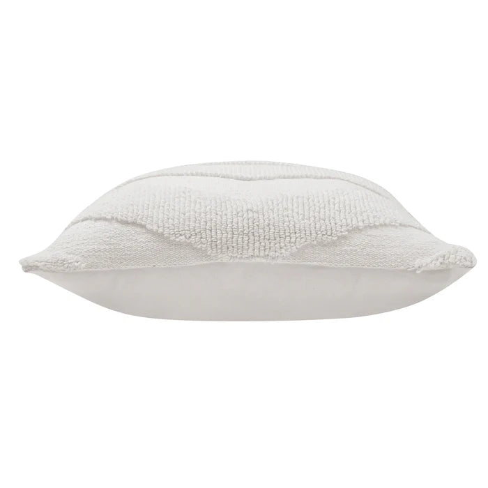 Side profile view of the plush Seraphina knitted chevron pillow showcasing its thickness and soft cream fabric.