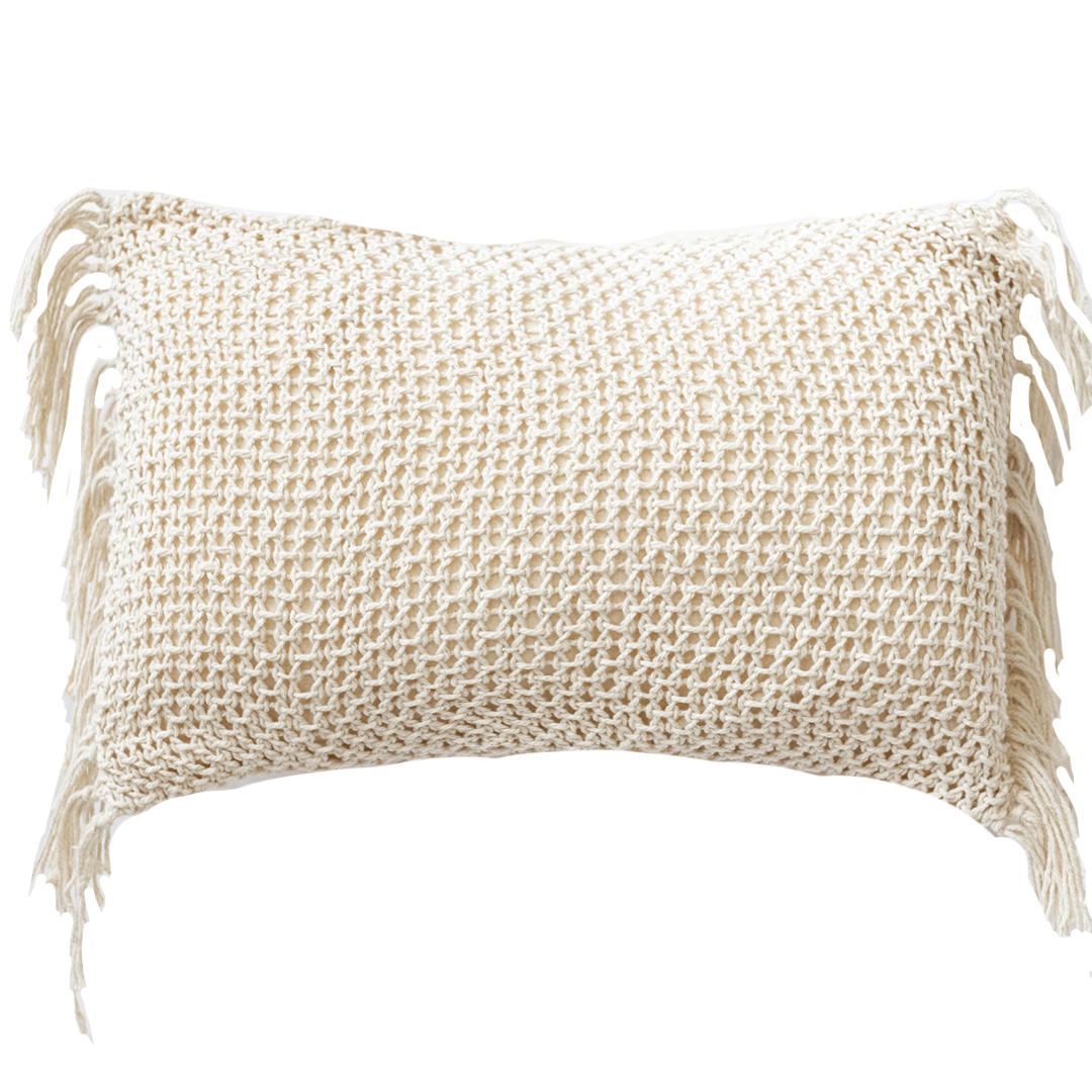 Beige woven headband with fringe on a white background