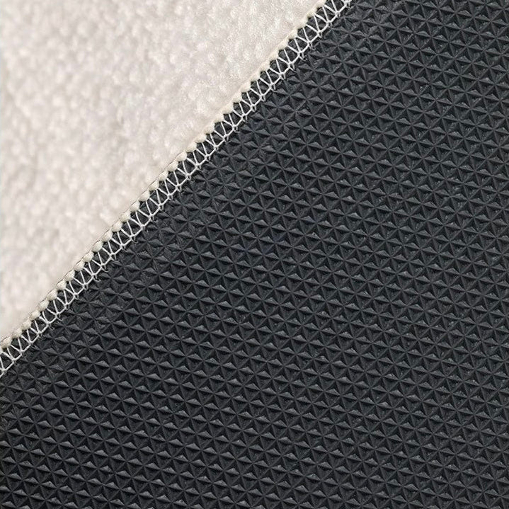 Close-up of the Serenity Stripes Carpet showing its textured surface and non-slip backing detail.