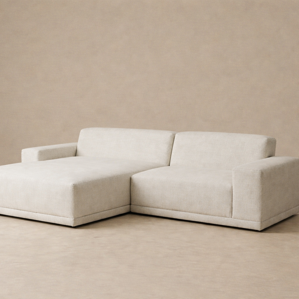 Perspective view of the Solis beige modular sectional sofa highlighting the wide armrests and plush cushioning.