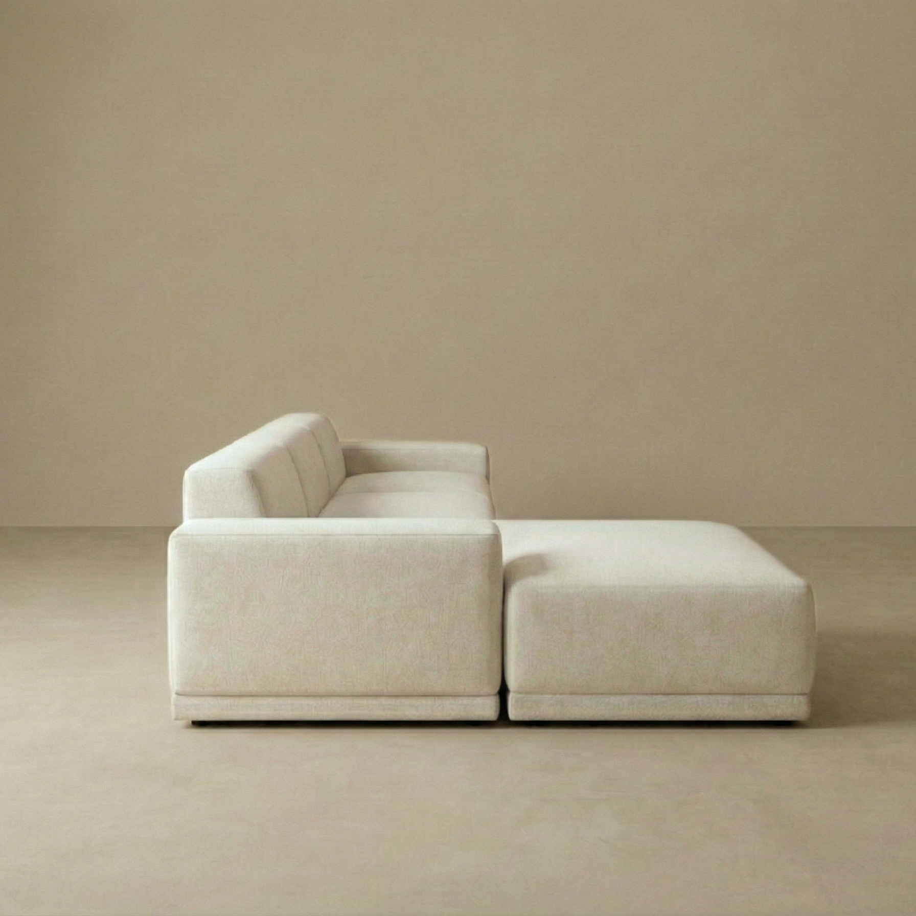 Side profile view of the Solis modular sofa showing the deep seat depth and seamless low back design.
