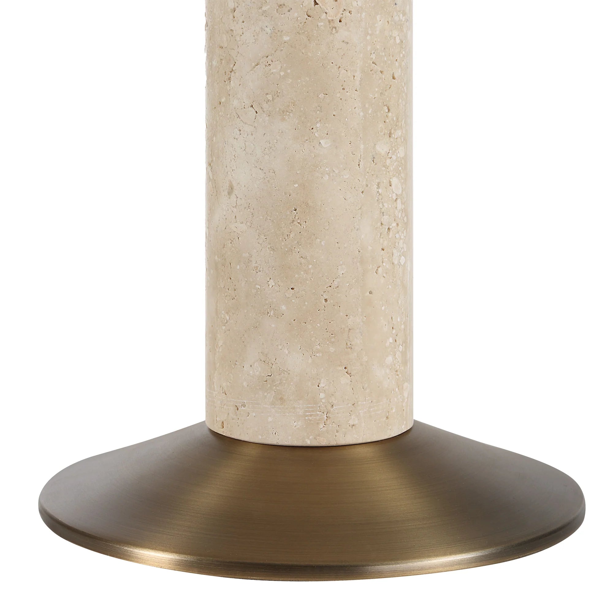 Close-up showing the natural porous texture of the Tivoli lamp's travertine stone column and its brushed brass base.