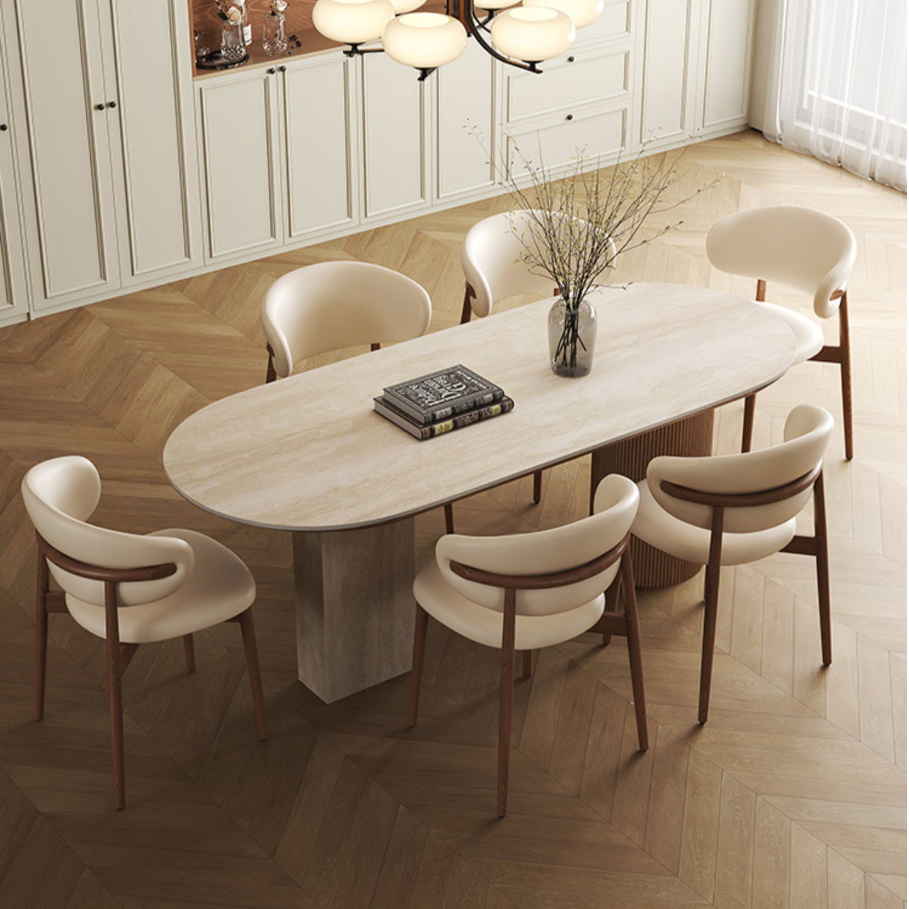 Top view of travertine sintered stone dining table with wood base and six cream chairs in modern kitchen interior