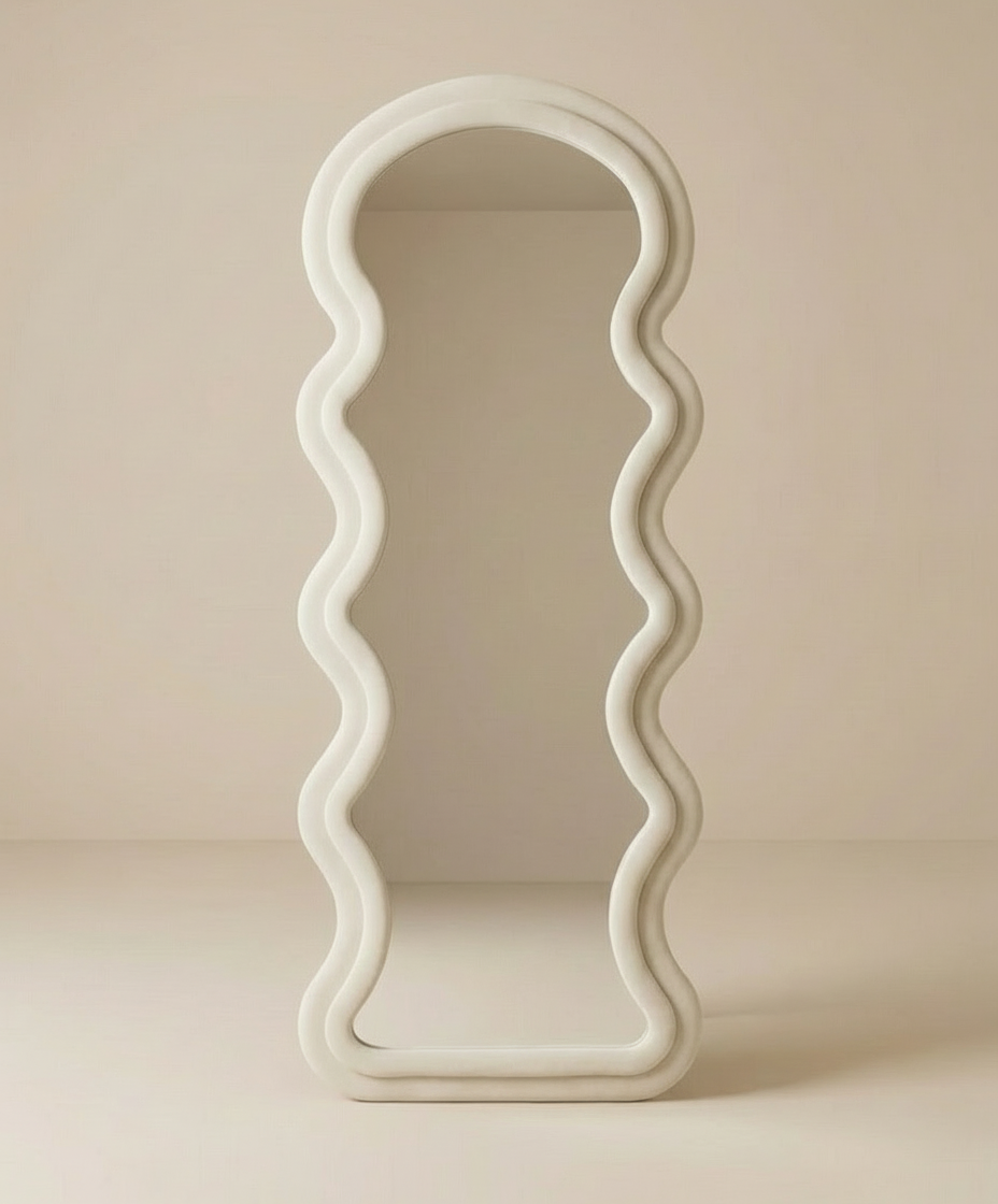 Wavy Floor Full Body Mirror with sculptural curved frame in a neutral minimalist setting.