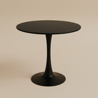 Black round table on a beige background