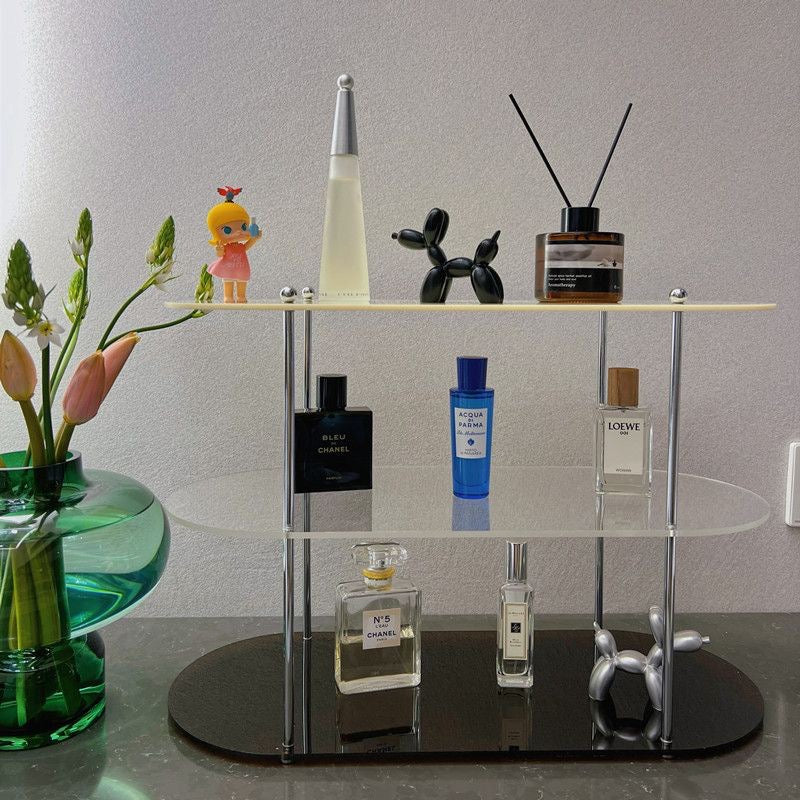 Acrylic Three-Tier Desktop Organizer displaying perfumes, reed diffuser, and decor on a vanity table