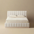 Front view of the Alora Ashwood bed featuring a vertical channel tufted headboard and matching footboard with a light wood plinth base.