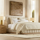 Alora Ashwood Bed shown styled in a bright bedroom with soft neutral bedding and matching night stands
