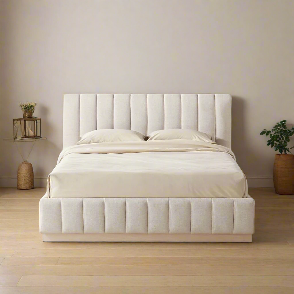 Alora Ashwood Bed with vertical tufted headboard styled in a minimalist neutral bedroom with plants and wooden floor