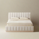 Alora Ashwood Bed featuring vertical tufted headboard and matching base in soft beige upholstery on neutral background