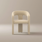 Archway Dining Chair with a sculpted curved backrest and upholstered beige seat, shown in a neutral studio setting