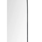 Close-up view of the Arco Wall Mirror showing its slim black metal edge detail