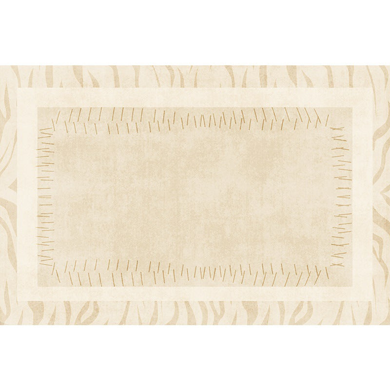 Artisan Stitched Ivory Rug with soft beige tones and subtle stitched border design