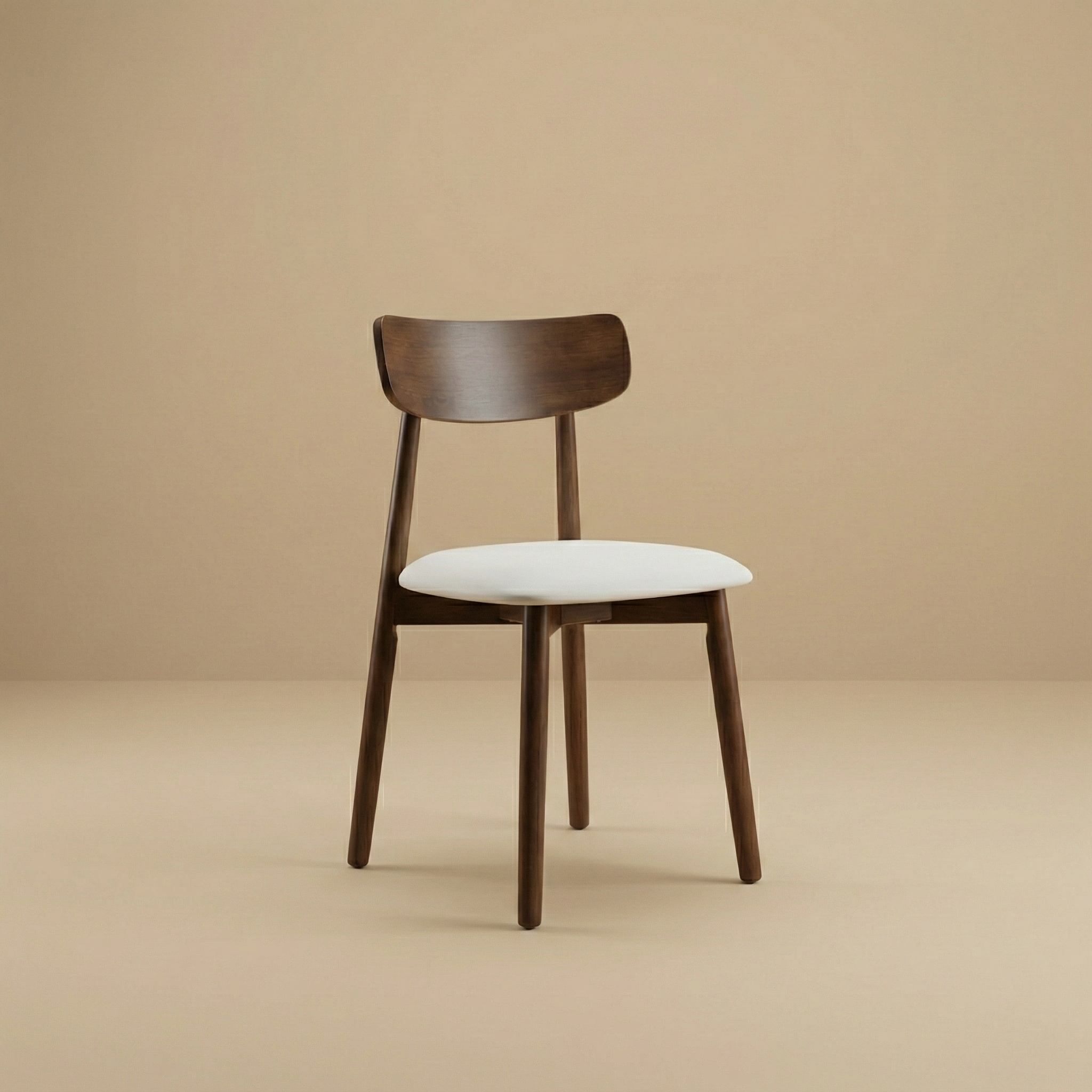 Ash Classic dining chair featuring a solid wood frame with a dark walnut finish, curved backrest, and cream upholstered seat.