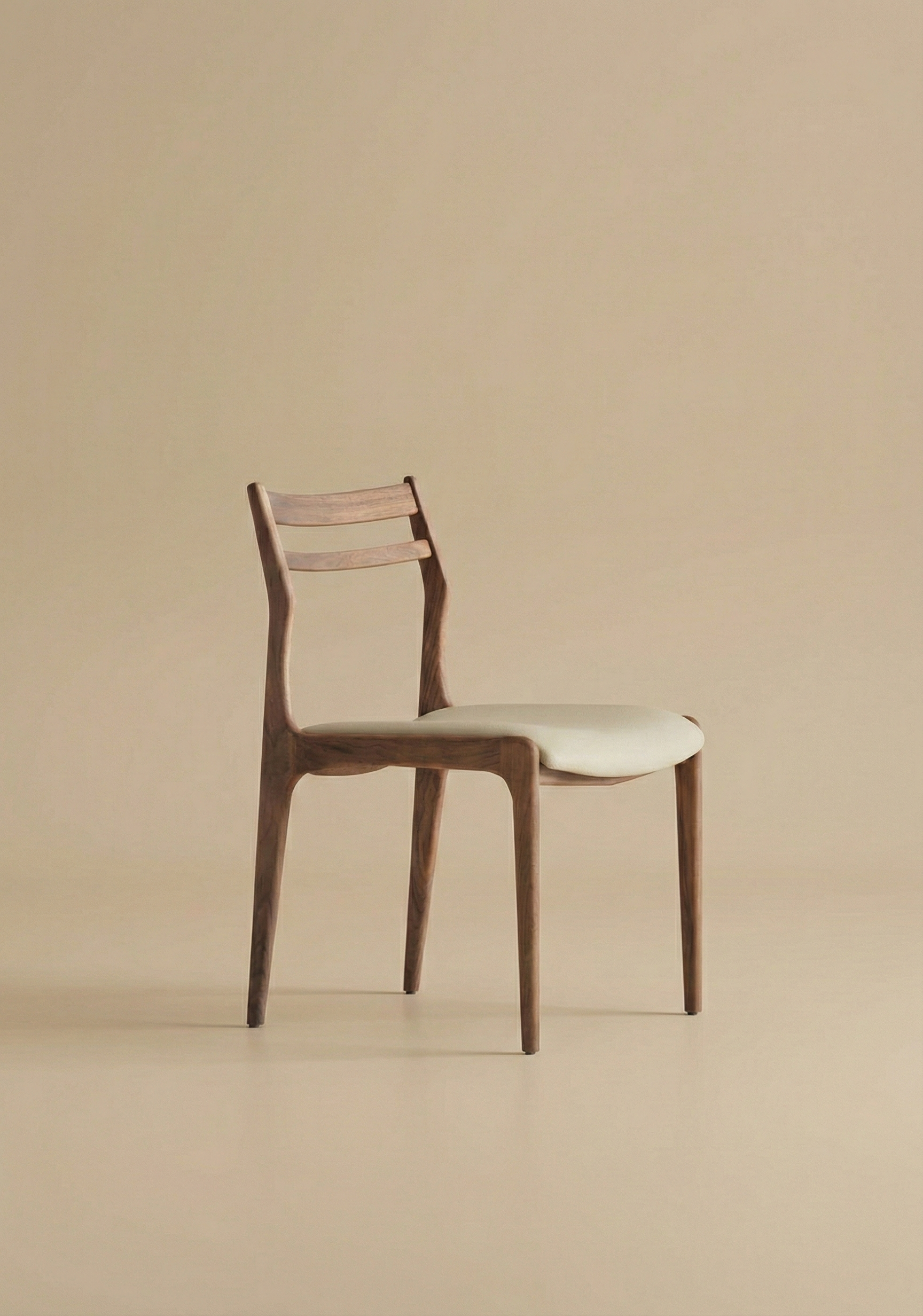 Wooden chair with a white faux leather cushion on a beige background