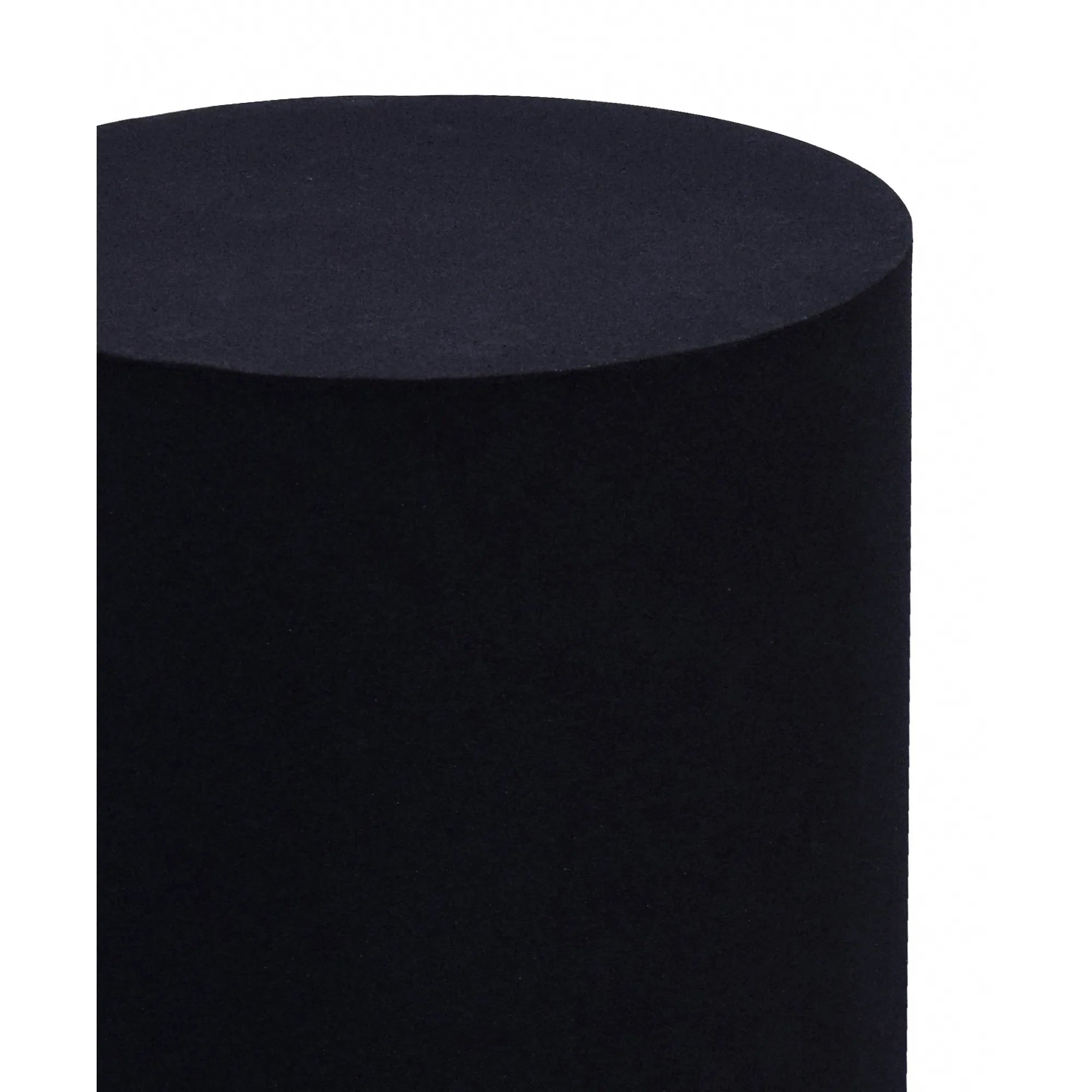 Close up view of the Atlas side table showing the smooth matte black finish and crisp cylindrical edge.