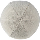 Top view of the ivory bouclé ball pillow highlighting its perfectly round spherical silhouette and panel construction.